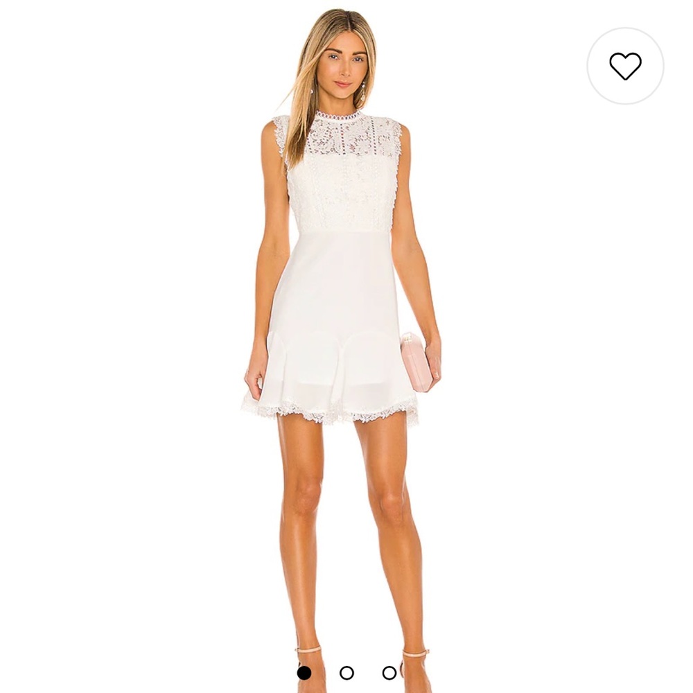 Worn once for my bridal shower! Great little white dress